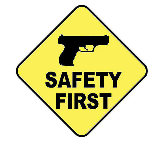 Safety first gun sign